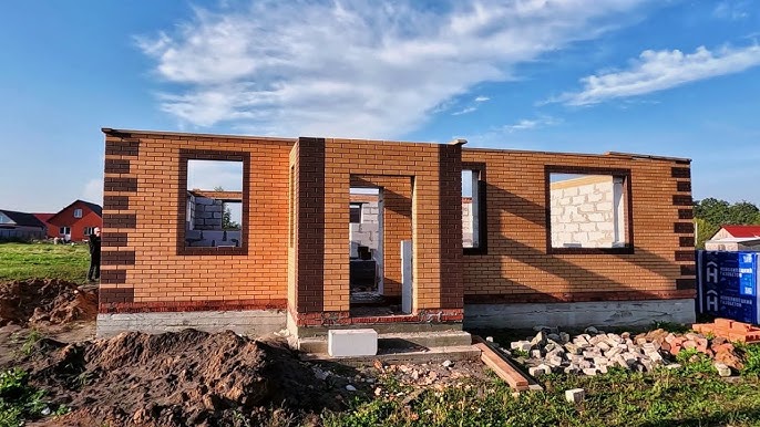процесс строительства дома из кирпича